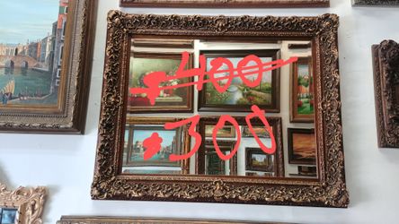 Antique bronze frame with mirror 49 x 61