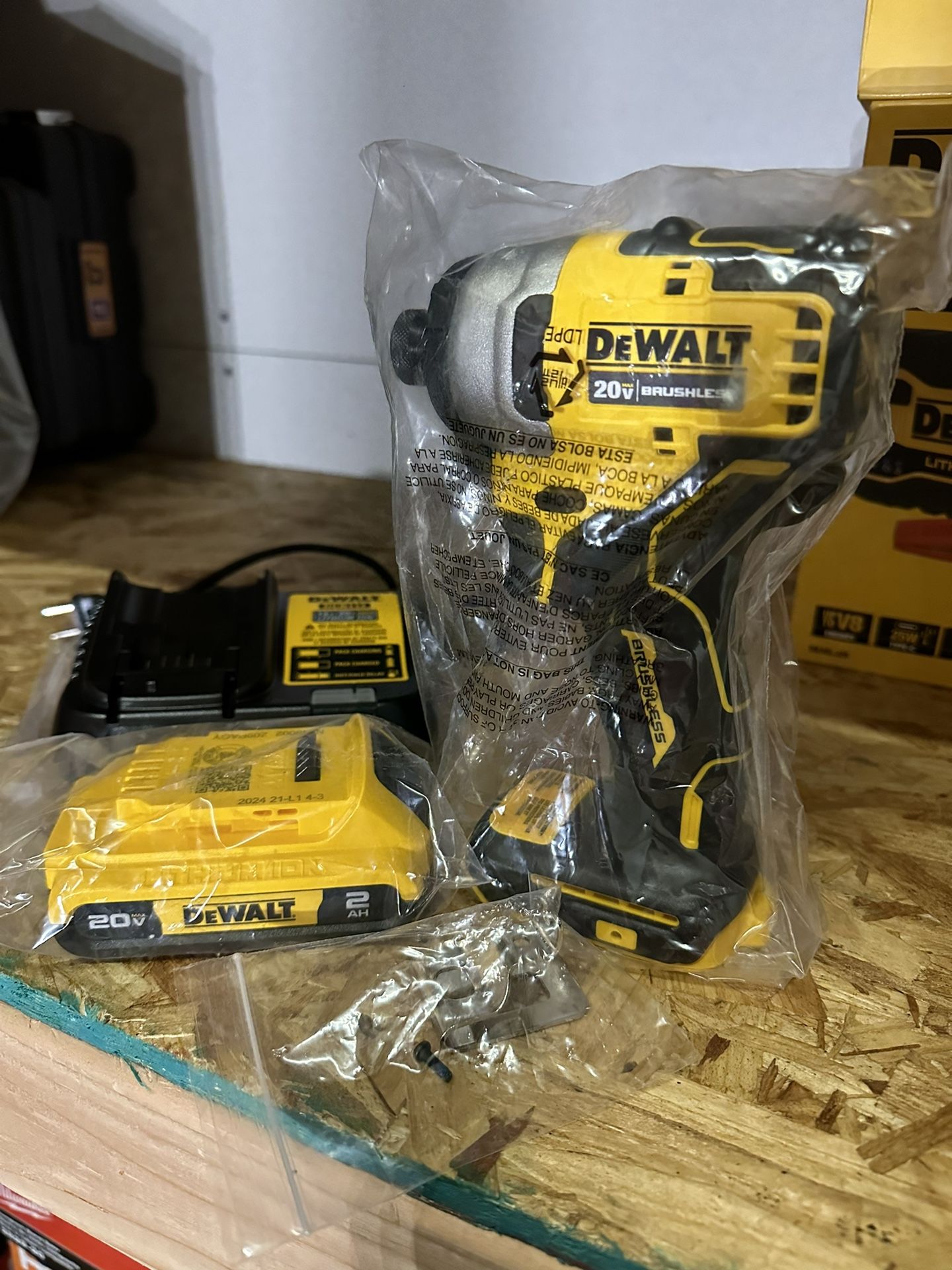 DEWALT ATOMIC 20V MAX Cordless Brushless Compact 1/4 in. Impact Driver, 2.0 battery, and Charger.
