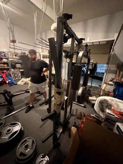 All in one workout station with weights and bars