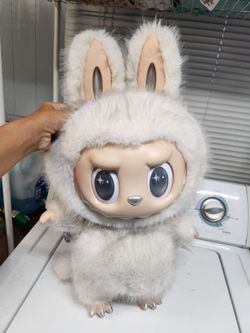 Huge Labubu angel in the clouds