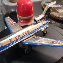 Antique United Tin Toy  Friction Airplane