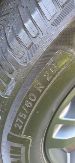 Selling a complete set of 4 OEM Ford F-150 wheels with tires.