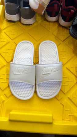 Nike slides.