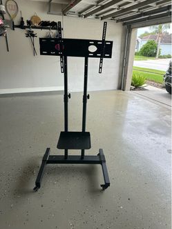 Rolling TV Stand. Up to 80” - like new
