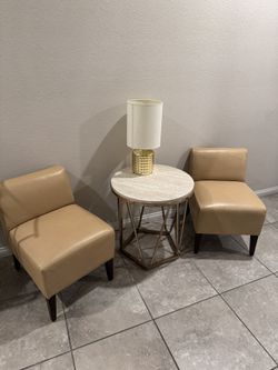 2 Leather Chairs And Table