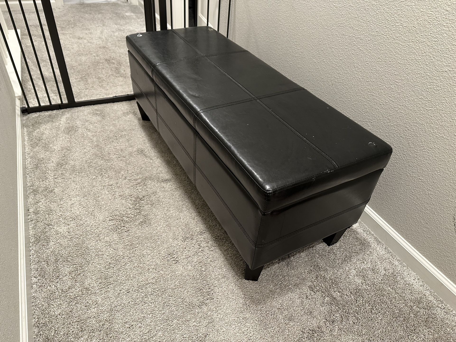 black storage ottoman