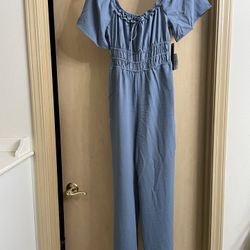 Brand new with tags adorable blue women’s romper size small. 