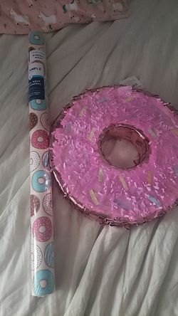 Donut pinata and wrapping paper brand new