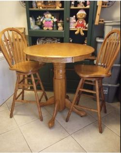 DINING TABLE BISTRO SET.  OAK. LARGE 3 FT DIAMETER WIDE. TALL 40' HEIGHT