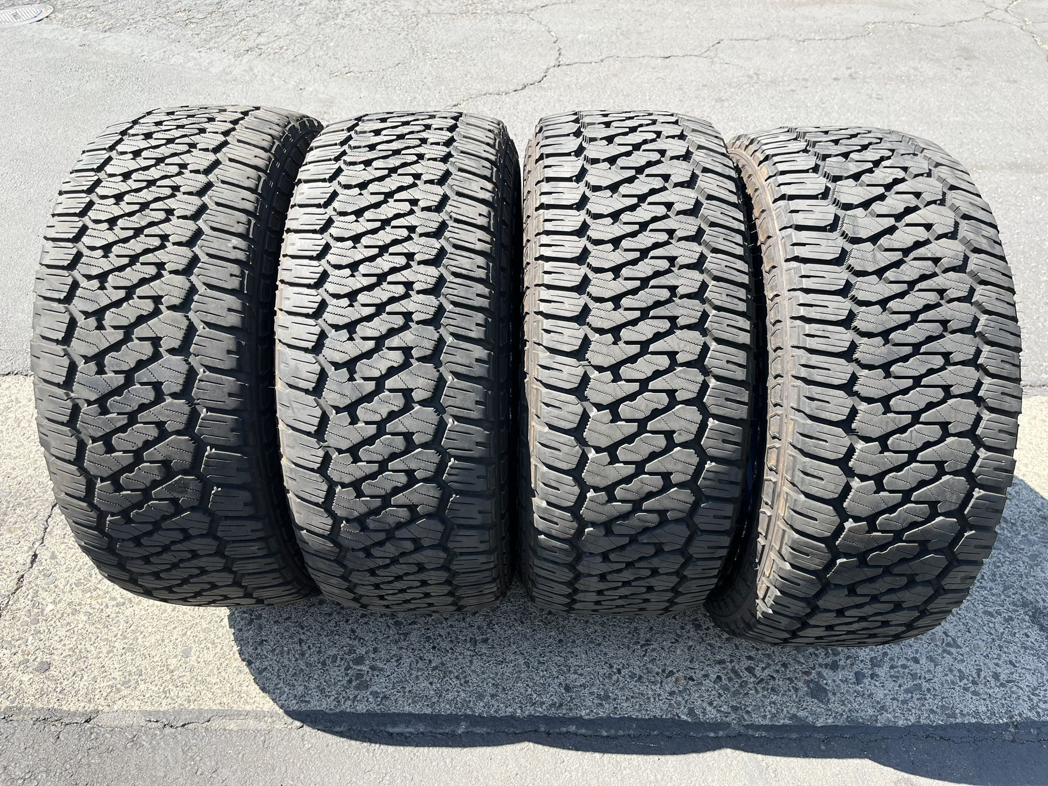 (4) 35x12.50R20 Firestone Tires