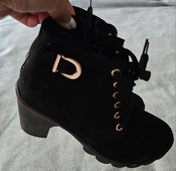 Black suede-like boots with heels