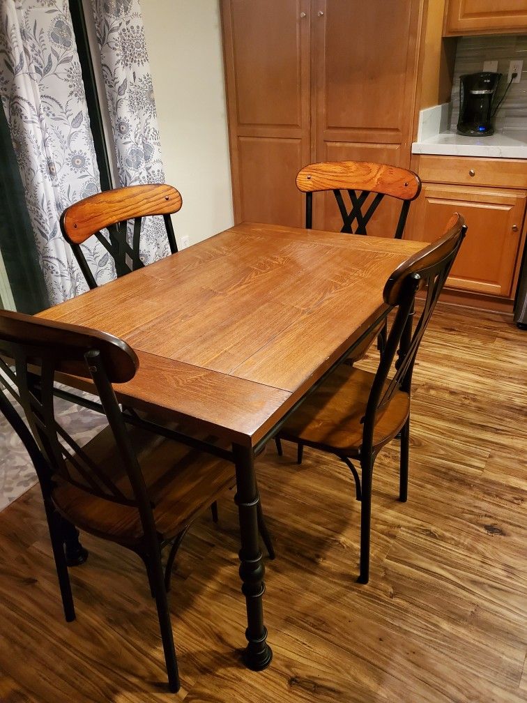 Wooden table and 4 chairs