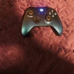 Blue and Black Xbox Controller 