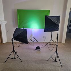 Portable green screen with 2 softbox lights and 1 tri light.