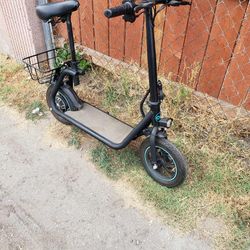 Like brand New Conditions. All Work 100% 0 Issues is electric scooter E-scooter Ebike e-bike Folding with seat. Mil3s 0055 miles Low 18mph 30 miles ra