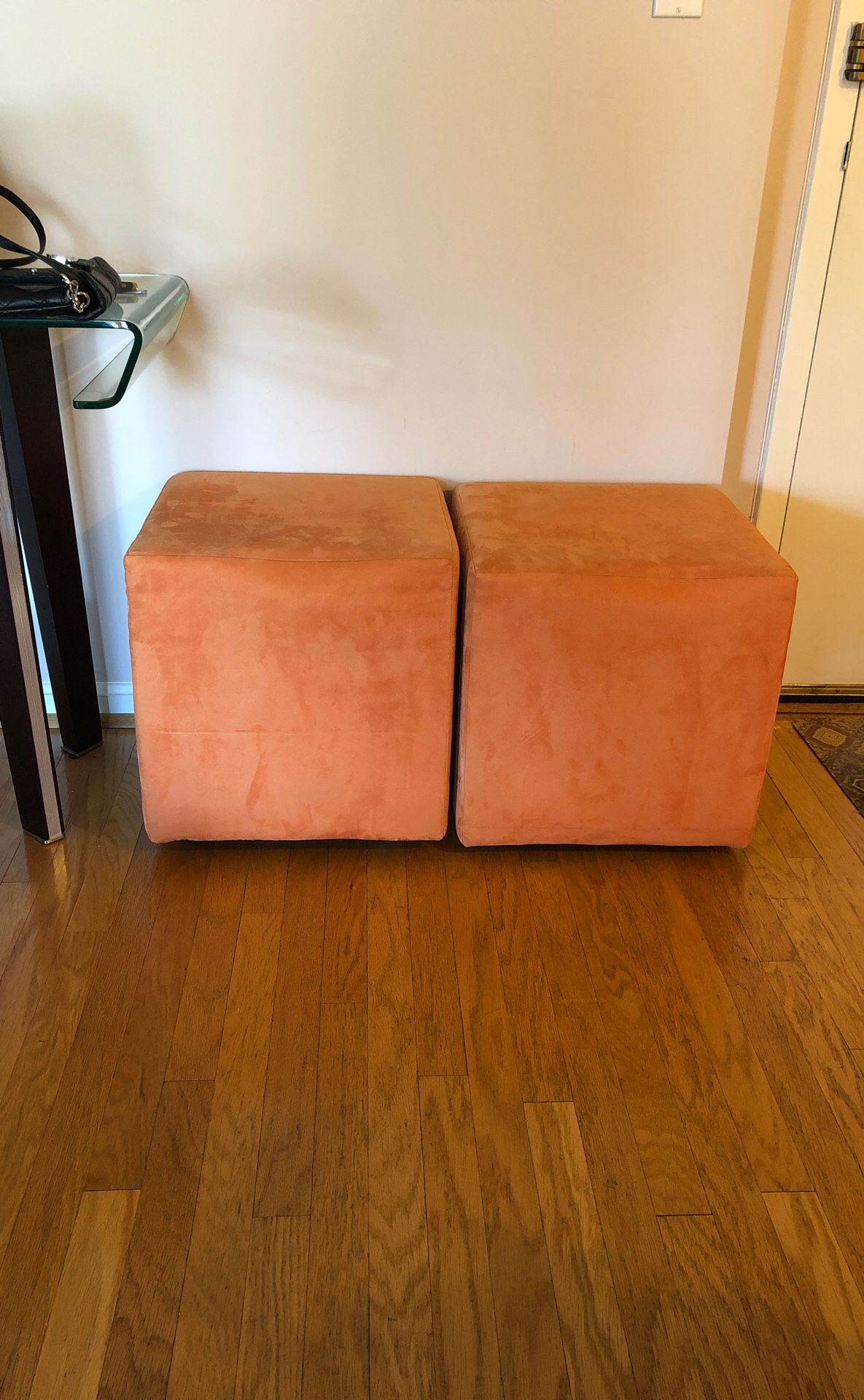 2 west elm orange cube chairs with wheels