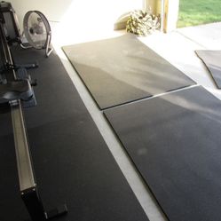 Two 1/4” Thick Solid Black Rubber Mats