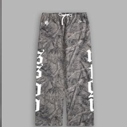 DARC SPORT X OUR MANTRA DRIFTWOOD FOREST CAMO BIGELOW SWEATPANTS  