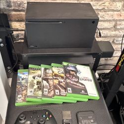 Xbox Series X with Extra Storage and games