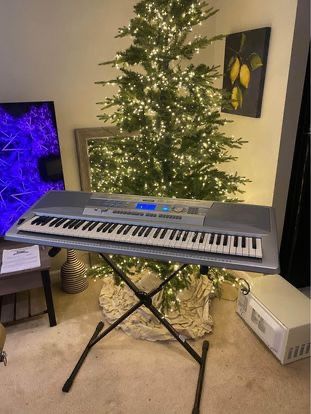 Yamaha Portable Grand 76-Key Electronic Music Keyboard with Portable Stand & Charger