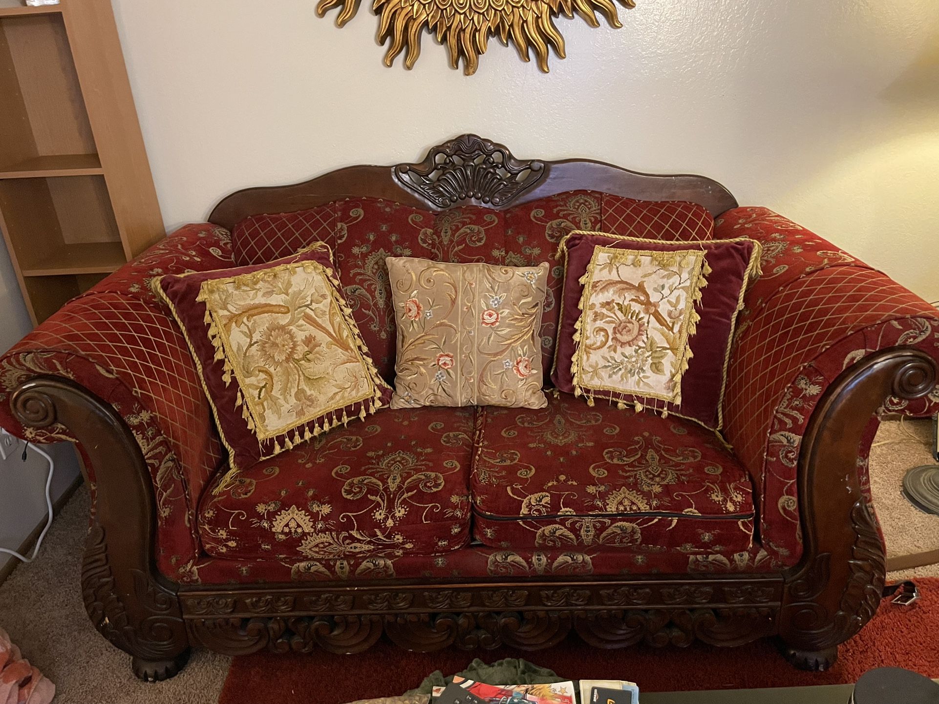 Red Antique Wood Couch with Pillows