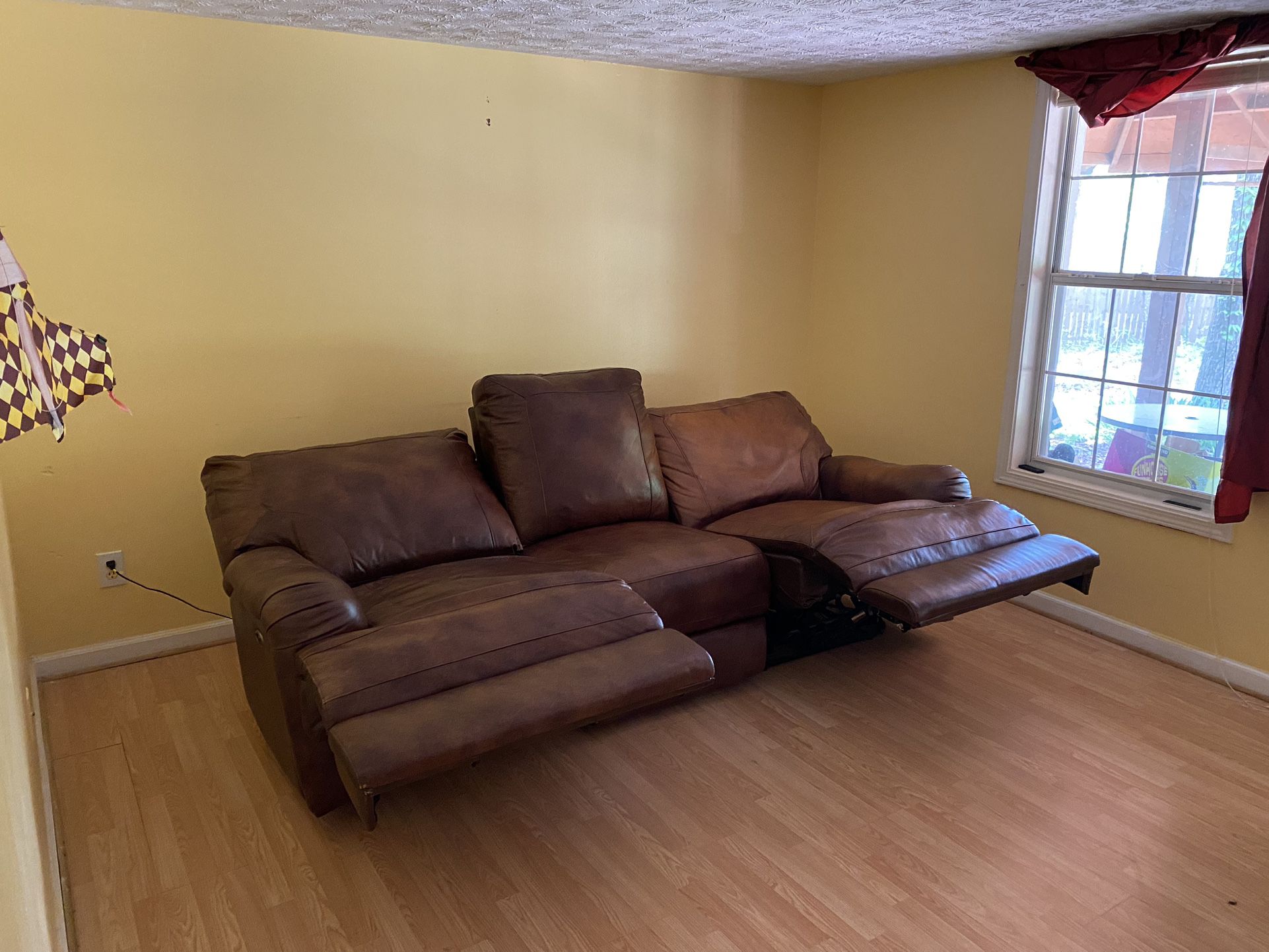  Leather Dual Power   Reclining Sofa  With One Recliner.  