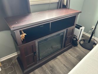 Electric fire place $25 will need  to possible replace cord  or get new insert
