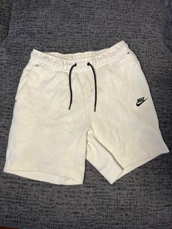 White Nike tech shorts