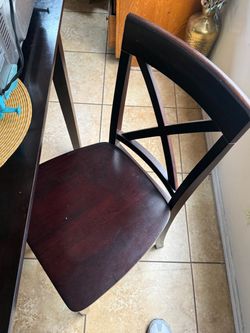 Dark Wood Dining Chair with Cross-Back Design