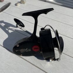 Two (2) Mitchel  302 Saltwater  Spinning Reels
