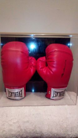 Authentic hand sighed Muhammad Ali pair of boxing glove's has certified numbered hulagram
