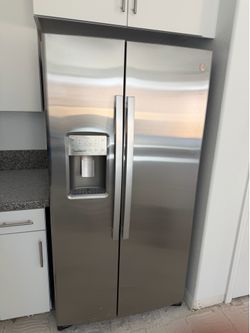 New GE Profile 21.9 cu. ft. Side by side Refrigerator