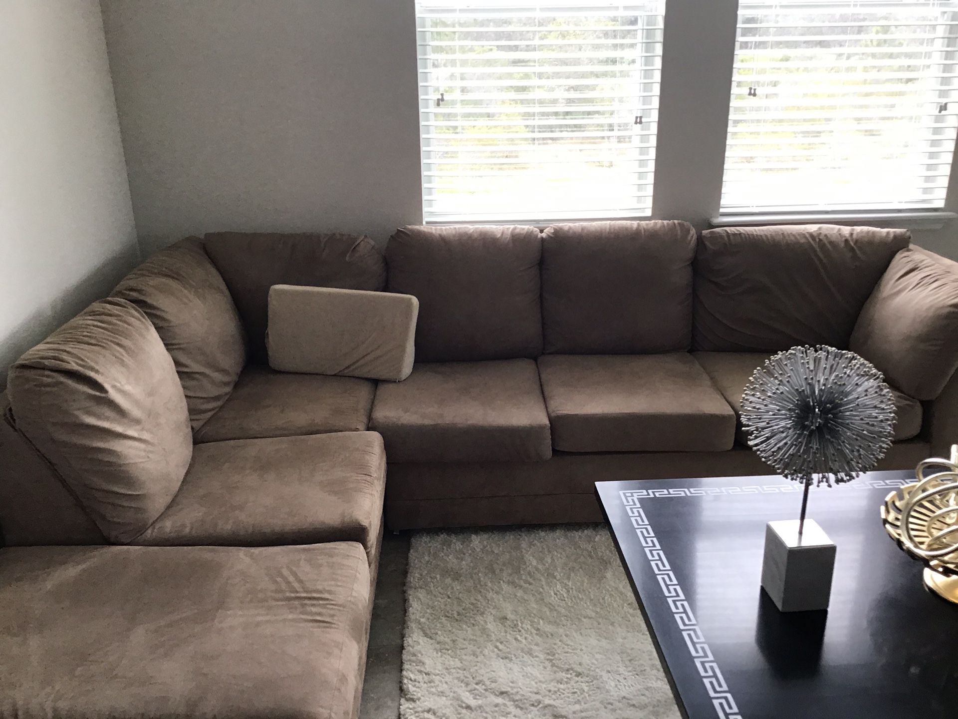 Brown suede sectional couch