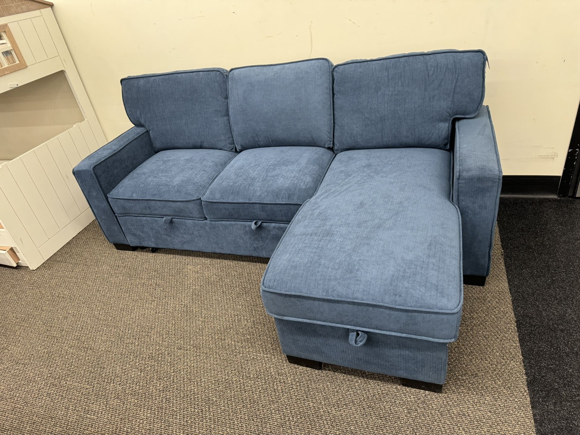 Slightly Used Sectional With Cup holder And Turns Into A Bed 