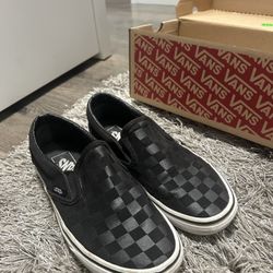 All black checkered vans 