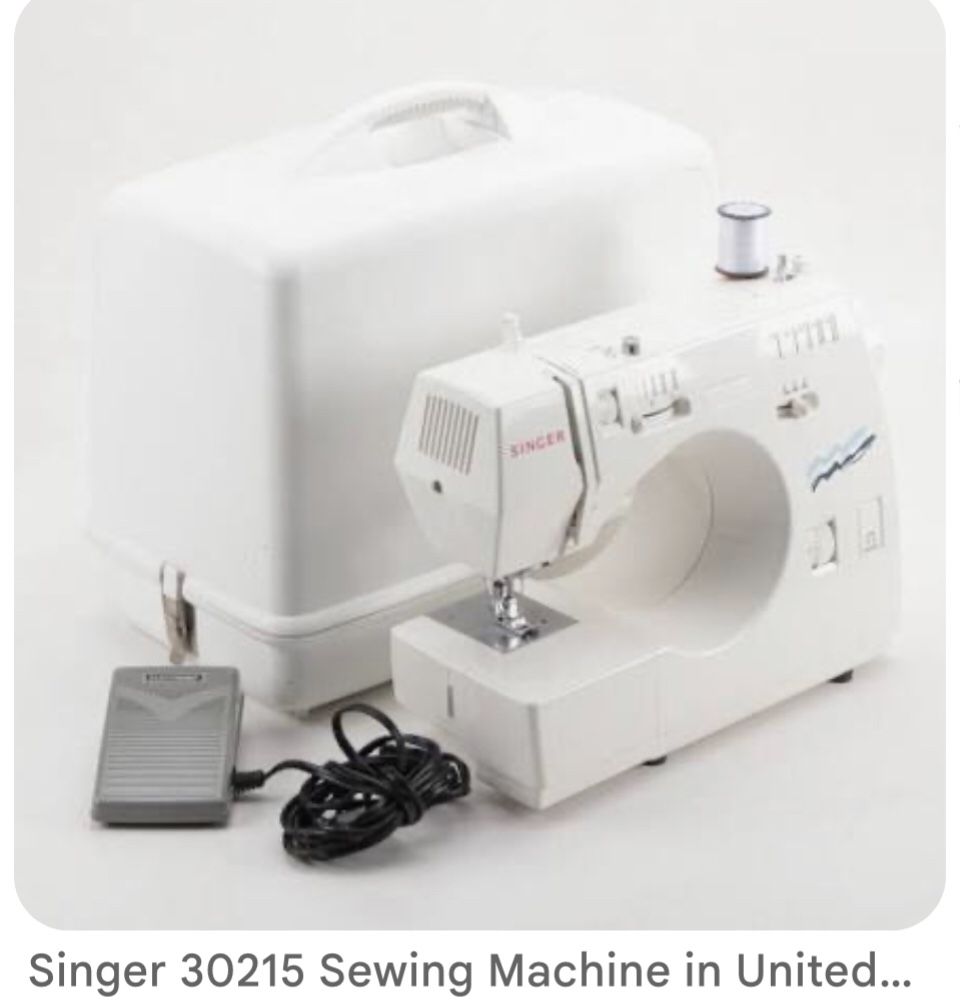 electric /standard sewing machine-singer 