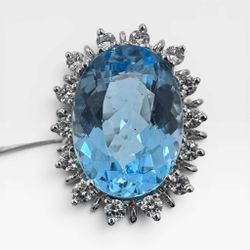 14k White Gold Ring with 10.00Ct. Topaz and Diamonds 0.56 Ct. (Size 5.25)