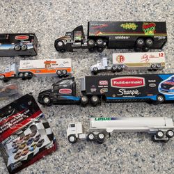 Box lot of NASCAR toy trucks and cars