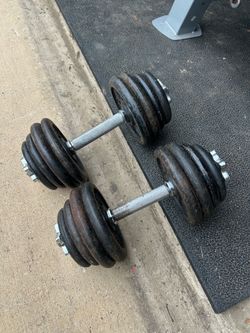 Around 70lbs total 35 each hand