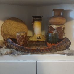 Indian Drums And Canoe