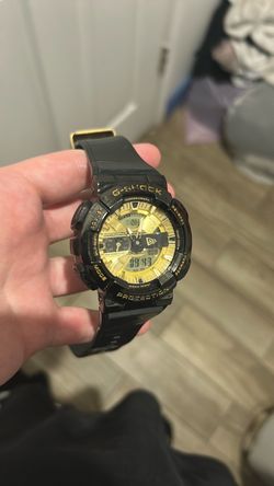 Casio G-Shock Black and Gold Watch