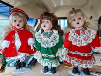 3 Christmas Carolers porcelain dolls