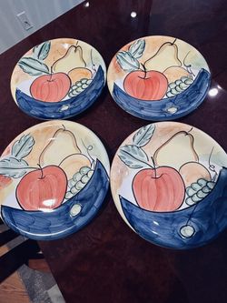 Hand MadePitcher and 4 big plates. All  made in Italy. Excellent condition 