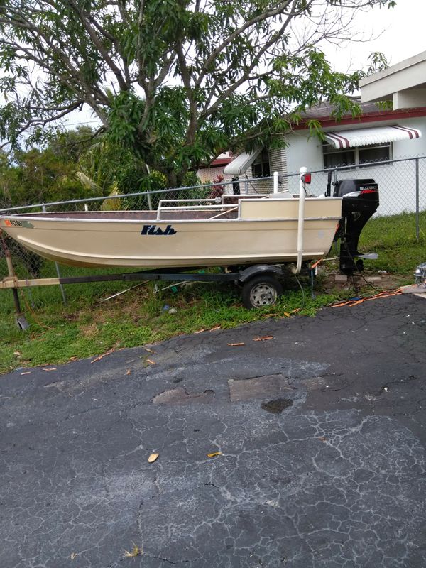 14 foot aluminum boat with 30 horsepower Suzuki outboard engine 2006