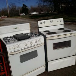 Electric Stove White With Grill In The Middle 