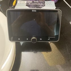 Boss touchscreen radio. Bluetooth comes with everything pull it up.