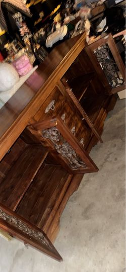 Carved Wood Dresser with Open Drawers