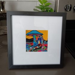 The Beatles Yellow Submarine 

4x4 picture on a 8x8 frame. Great for any Beatles fine. 