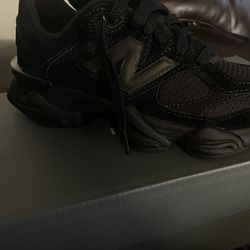 new balance 9060 fully black idk 