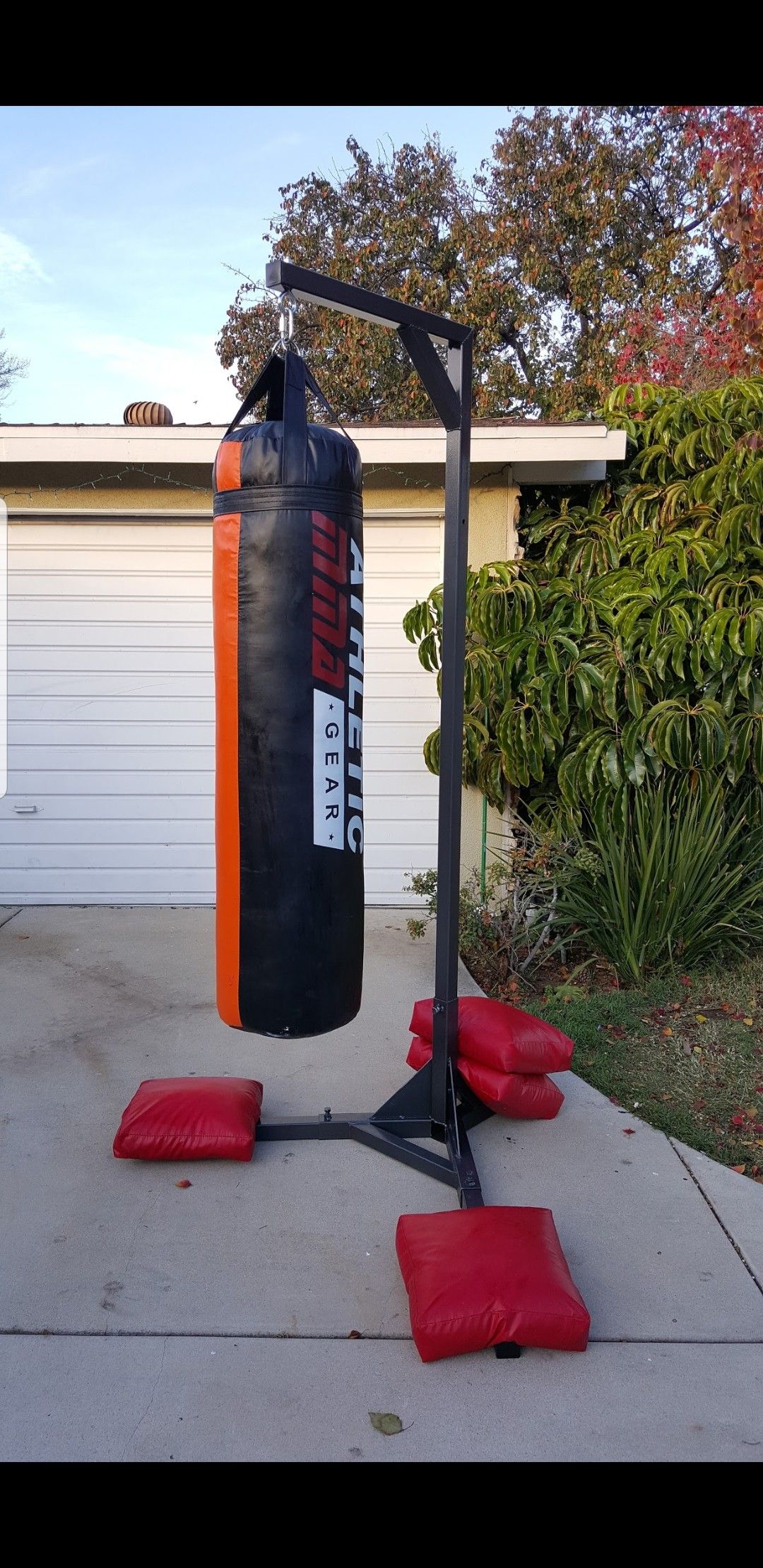 Punching bag stand, 100 LB heavy bag with 4 sand bags